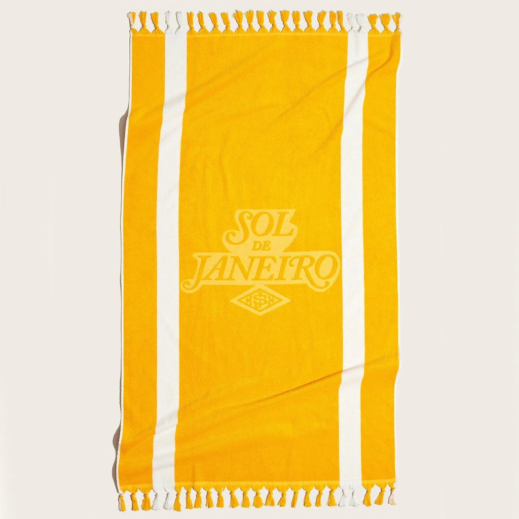 Sol de Janeiro Body Badalada Beach Towel Render. Beach towel is in sol de janeiro yellow