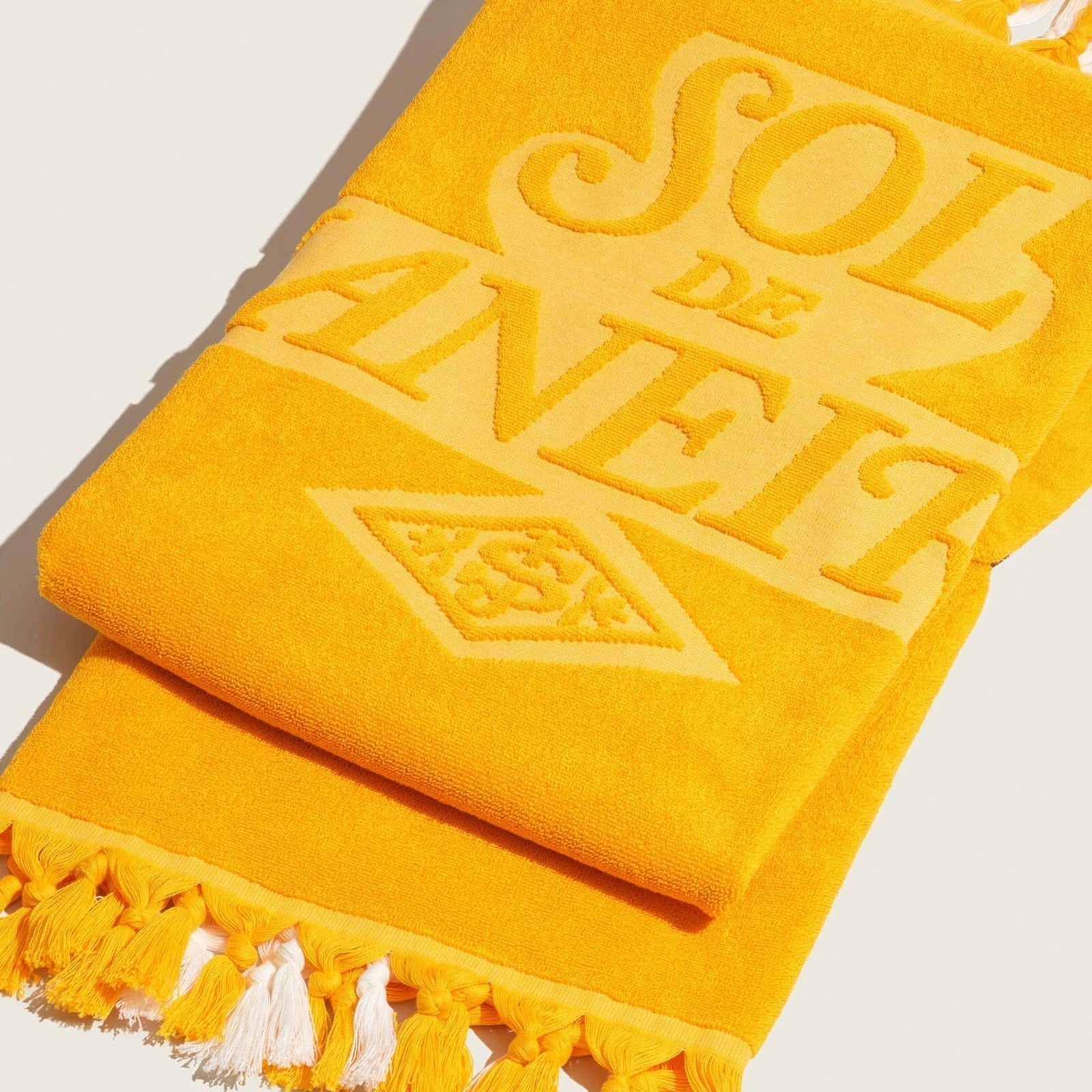 Close up image of the sol de janeiro beach towel